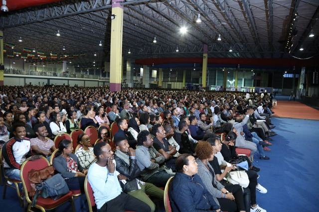 Large audience at a public lecture