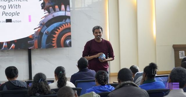 Speaker addressing participants
